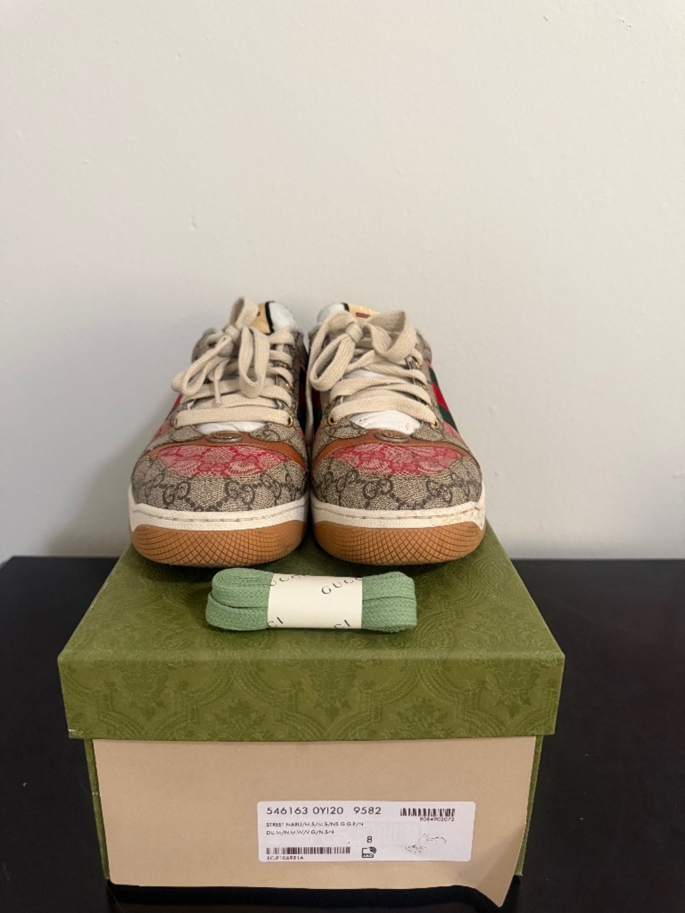 Gucci Screener Sneakers featuring the signature GG Supreme canvas